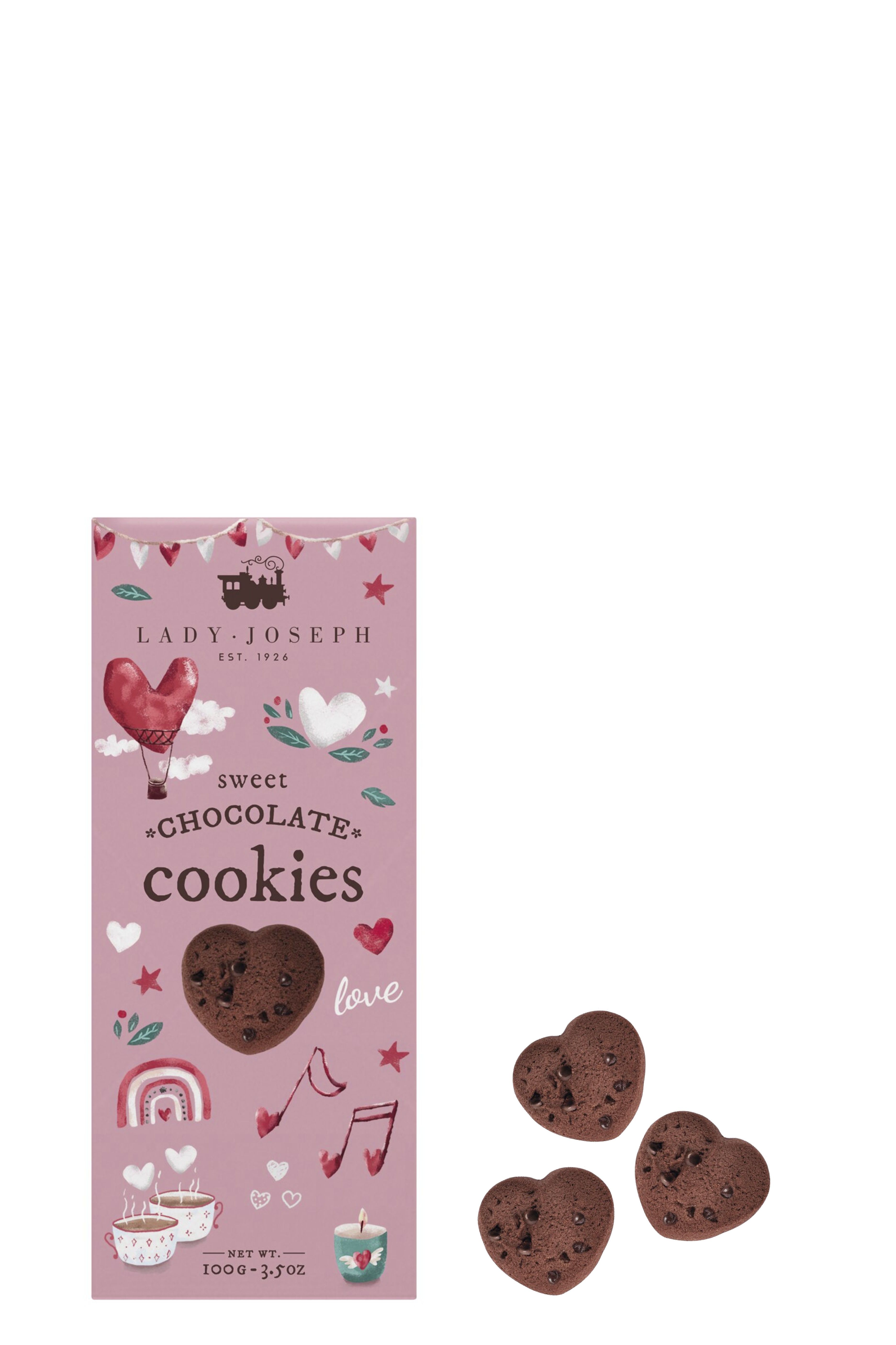 Rosafarbene Verpackung mit verspieltem Design und Herzmotiven. Darauf der Schriftzug „Lady Joseph – Sweet Chocolate Cookies“. Daneben drei herzförmige, schokoladige Kekse mit dunklen Schokostückchen. Inhalt: 100 g.